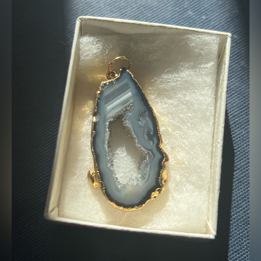Beautiful blue druzy agate pendant with gold accent.
